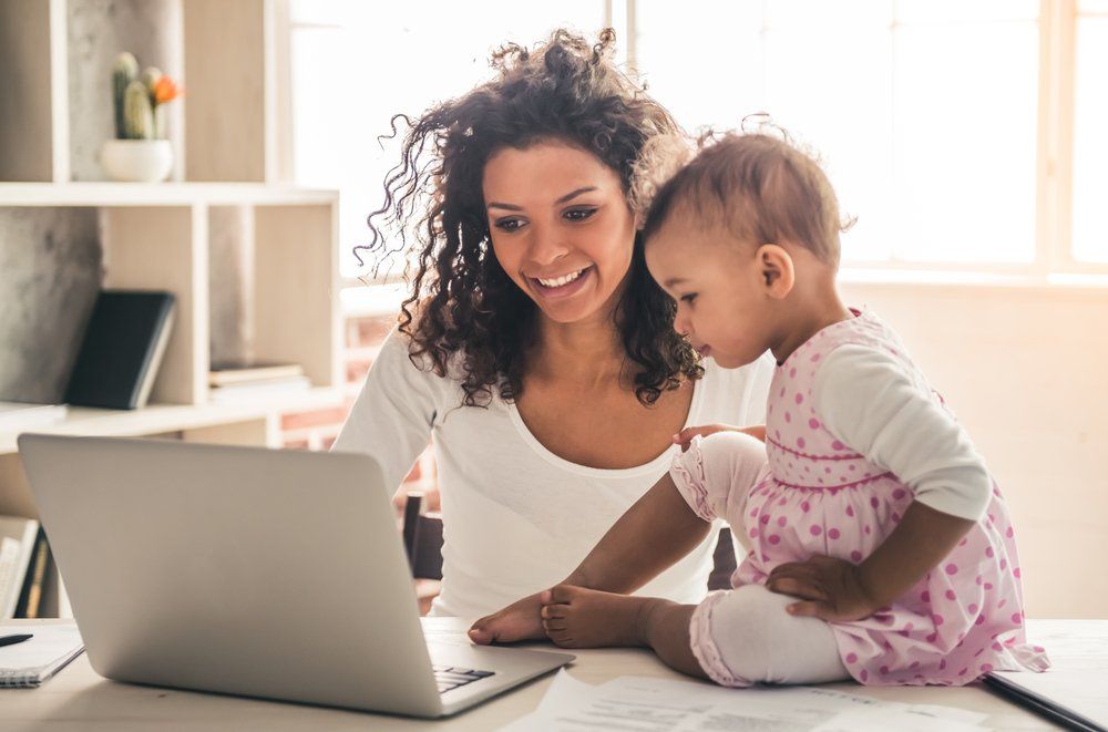 Family looking up info on computer