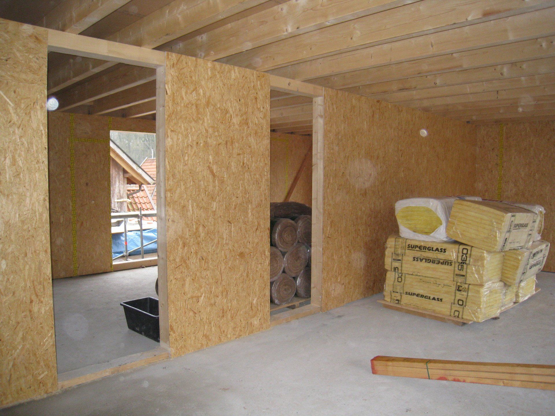 Eine Aufstockung in Holzrahmenbau ist ideal um Eigenleistung zu investieren