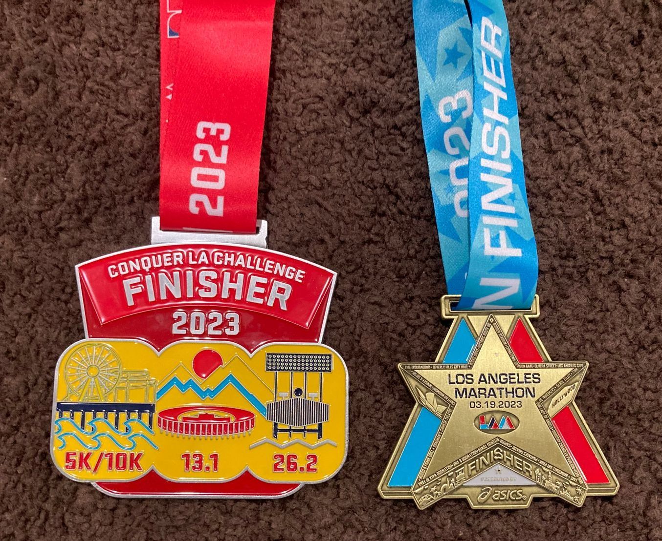 MD's metals for her arrival to the Finish Line in the 2023 LA Marathon. MD's metals for her arrival to the Finish Line in the 2023 LA Marathon.