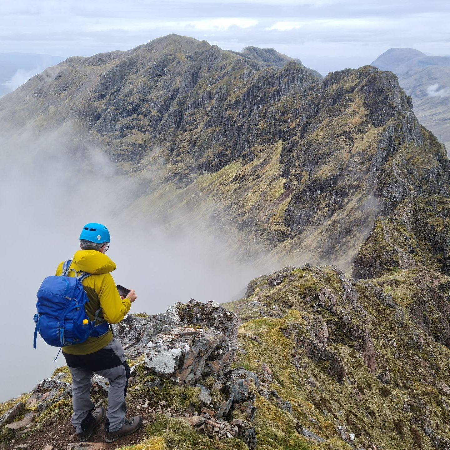 Elite Guides | Mountain Guides, Fort William, Scotland. Looking back along the Aonach Eagach with an Aonach Eagach Guide