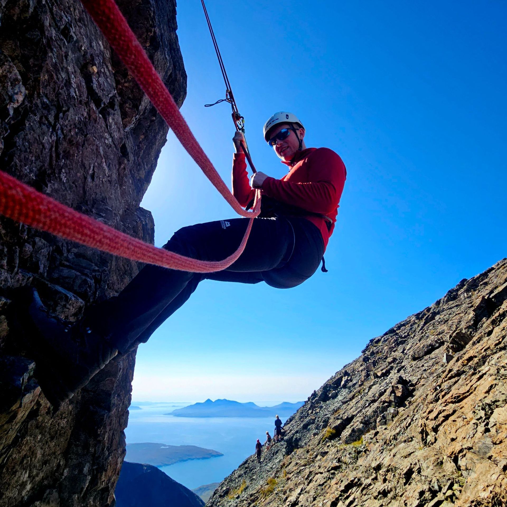Abseiling from the In Pinn on the Skye Cuillin Ridge.