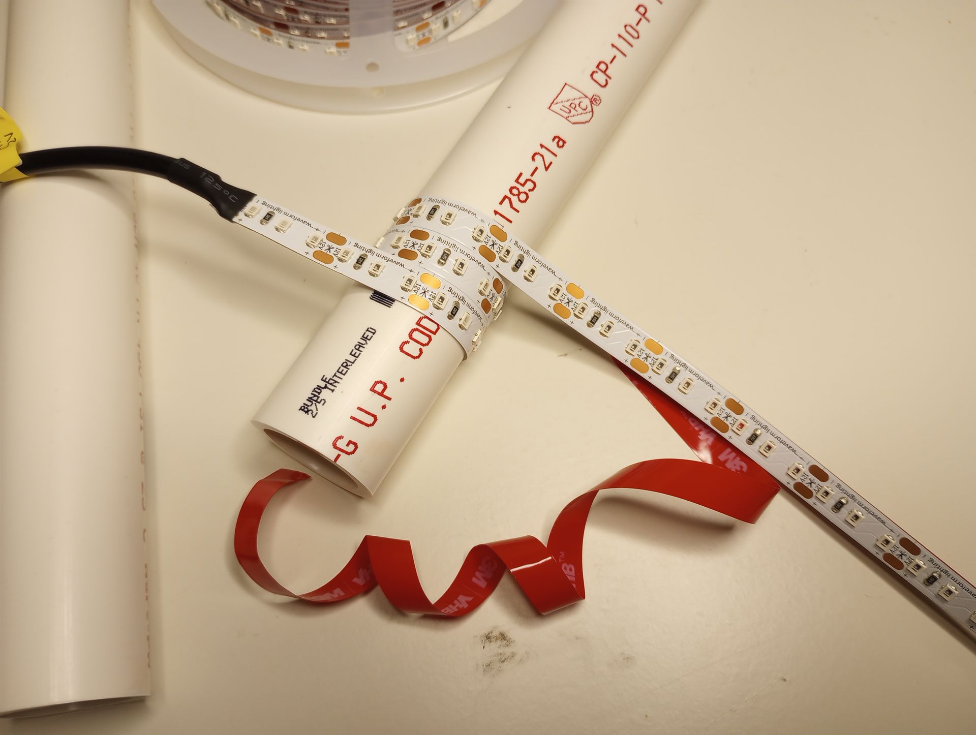 LED strip wrapped around one inch PVC pipe