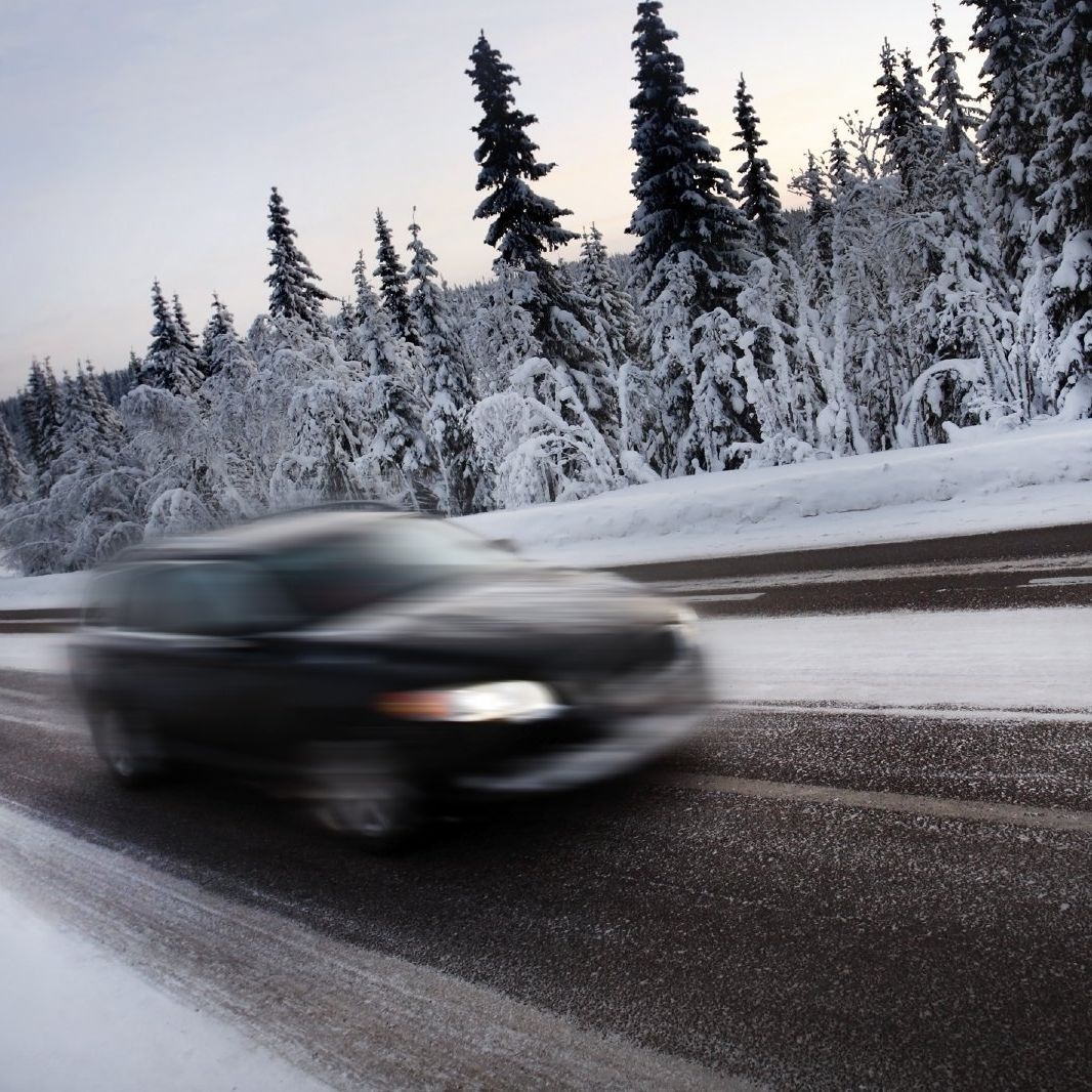 car driving on snowy road