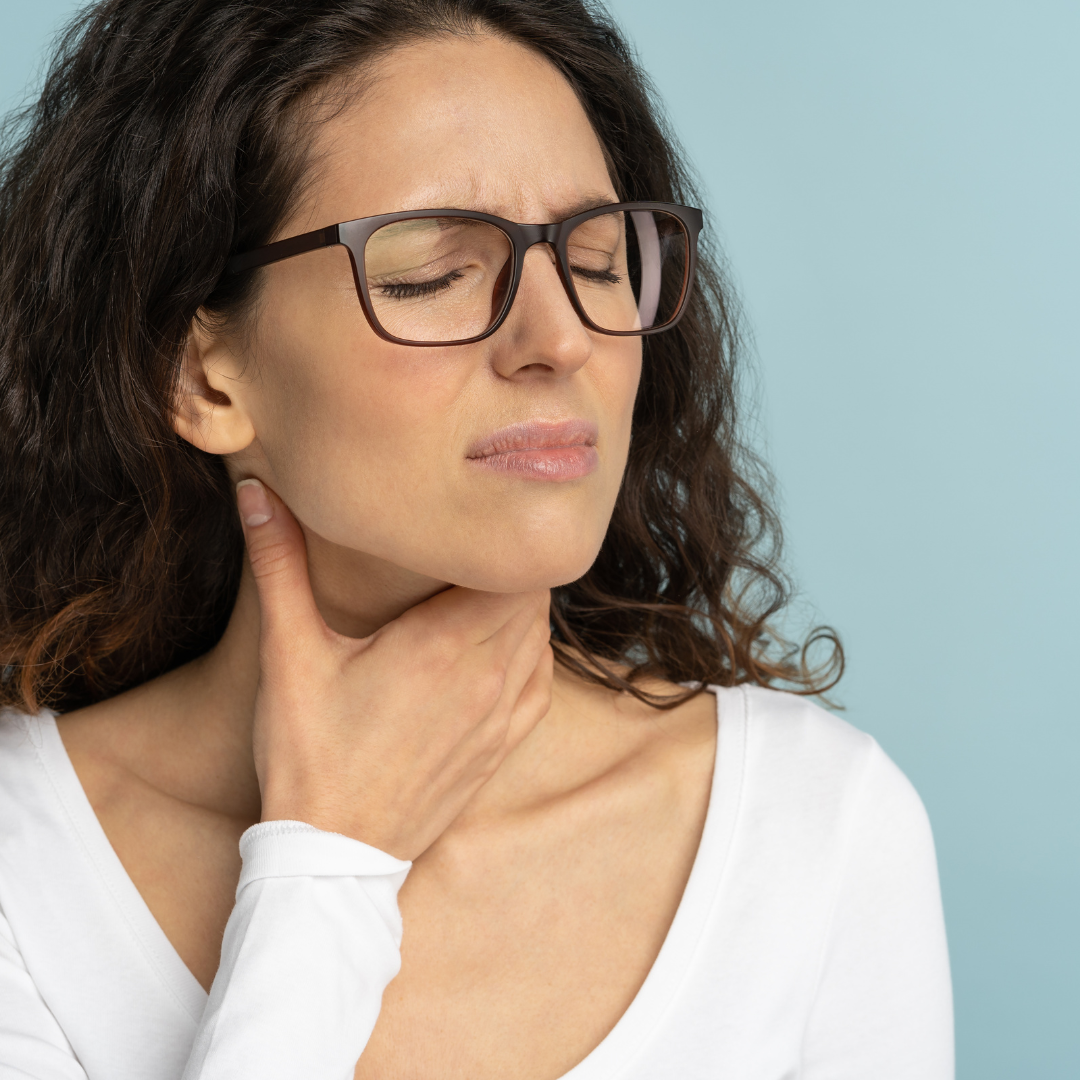 woman with sore throat