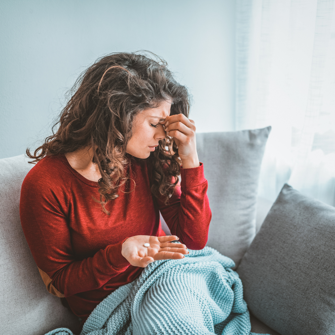 woman having migraine