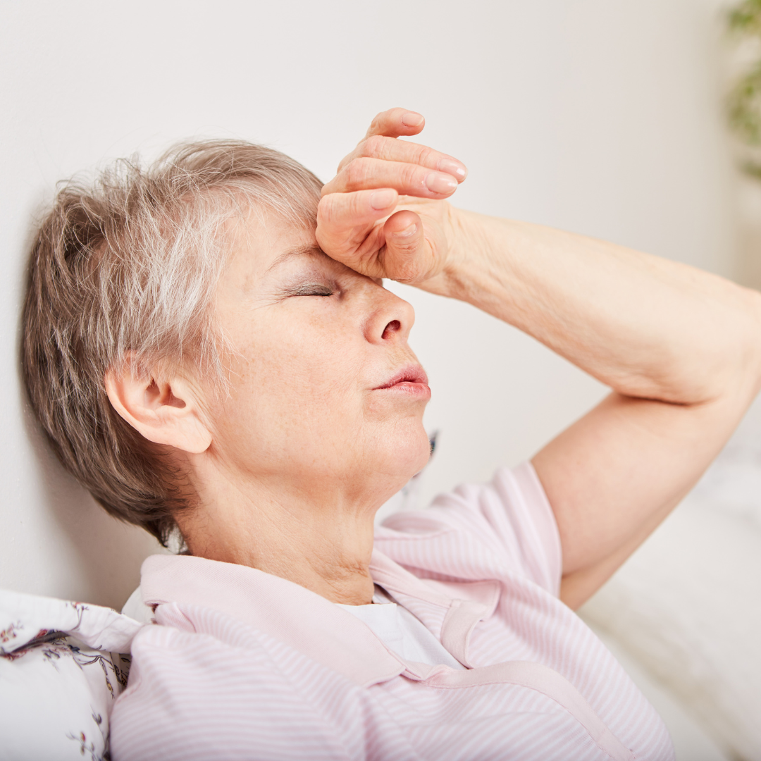 woman feeling sick