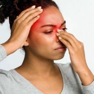 woman with sinus pain