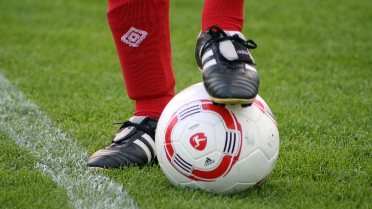 Player wearing shin guard under the socks
