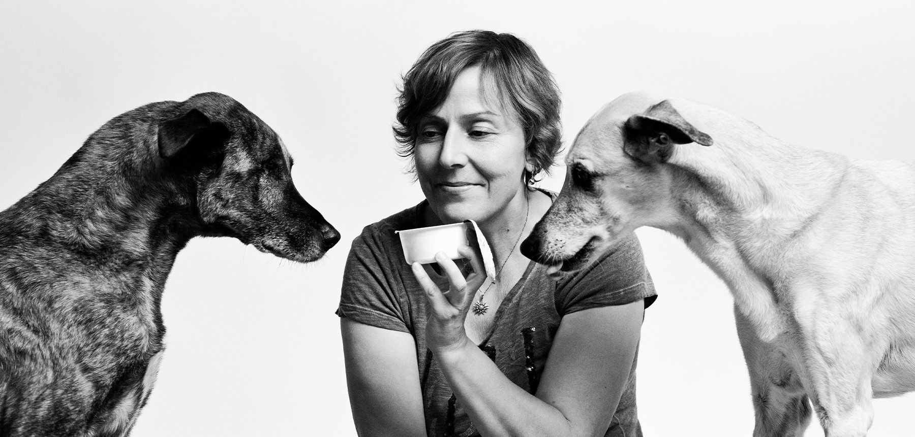 TAKE YOUR TIME Elke Vogelsang with her two dogs by Cornelia Köster