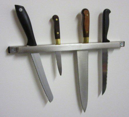 Stainless steel wall mounted knife holder Stainless steel wall mounted knife holder