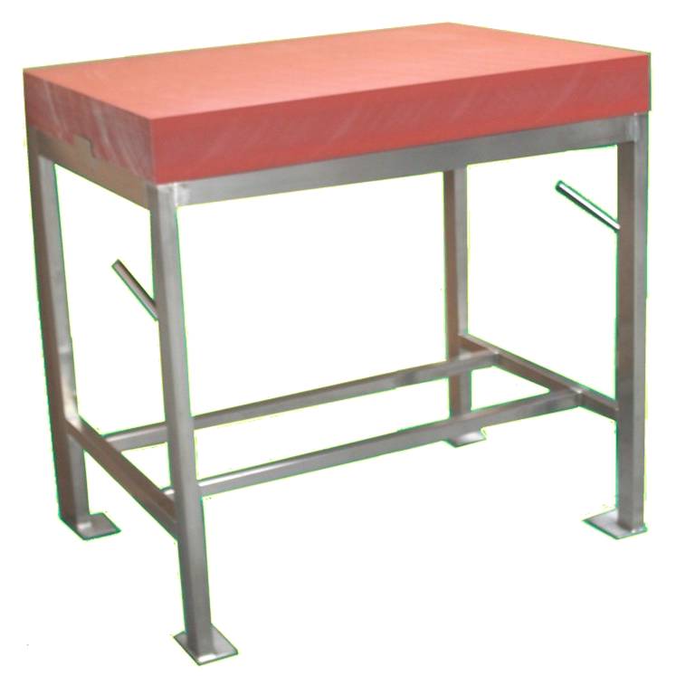 Polyethylene cutting board on stainless steel table Polyethylene cutting board on stainless steel table