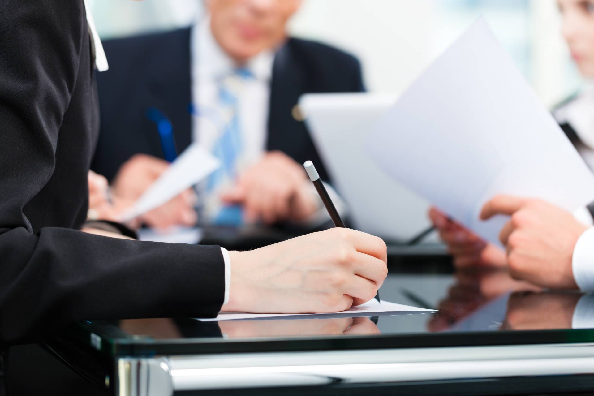 A meeting between Alliance & Cooper lawyers and clients