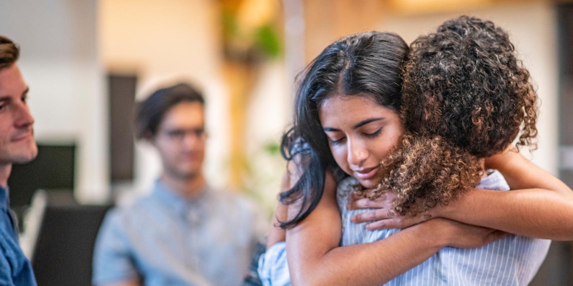 Two people hugging