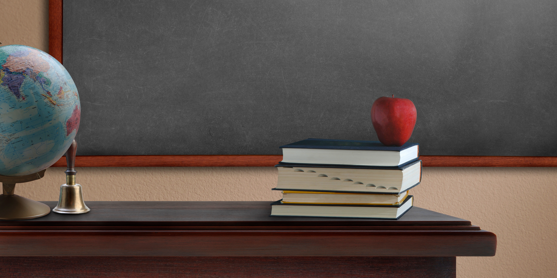 Apple on a teacher's desk