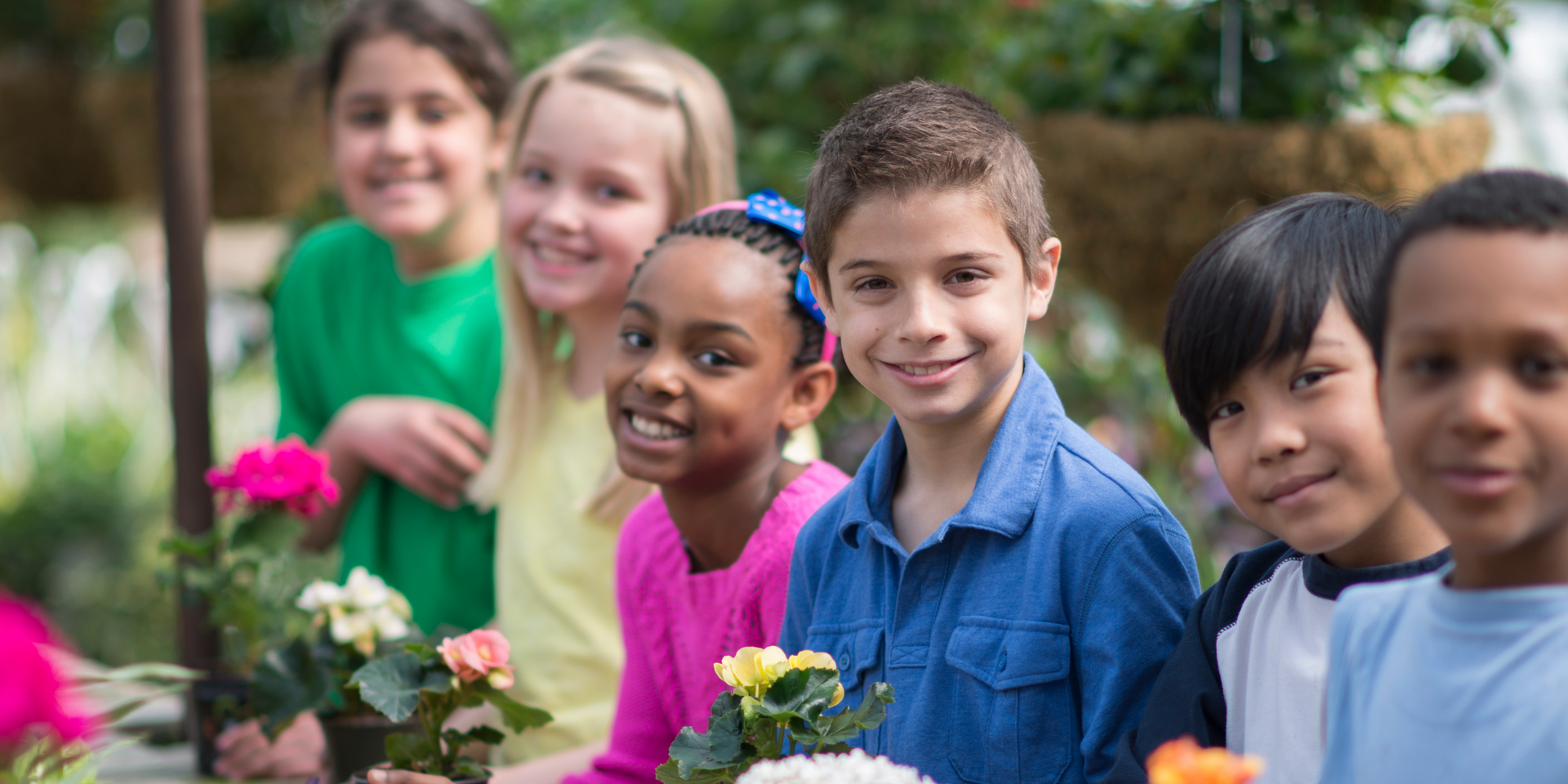 Kids planting flowers