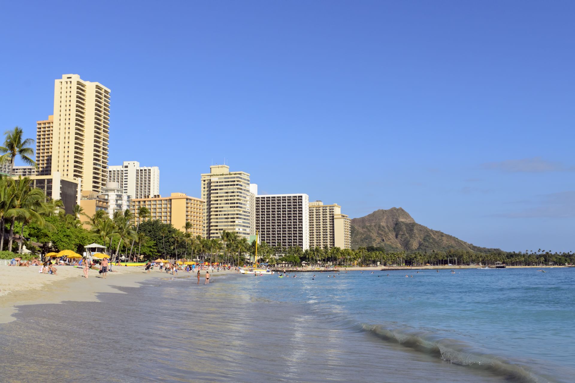 beach with apartment buildings in the background