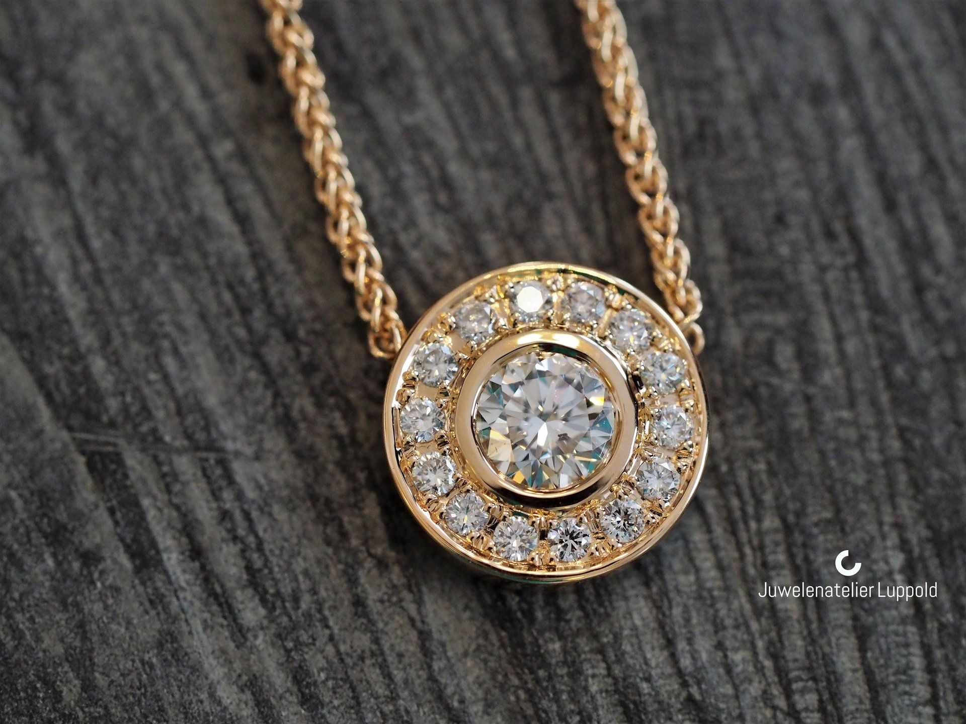 Umarbeitung Anhänger 750/-Gelbgold mit Brillanten