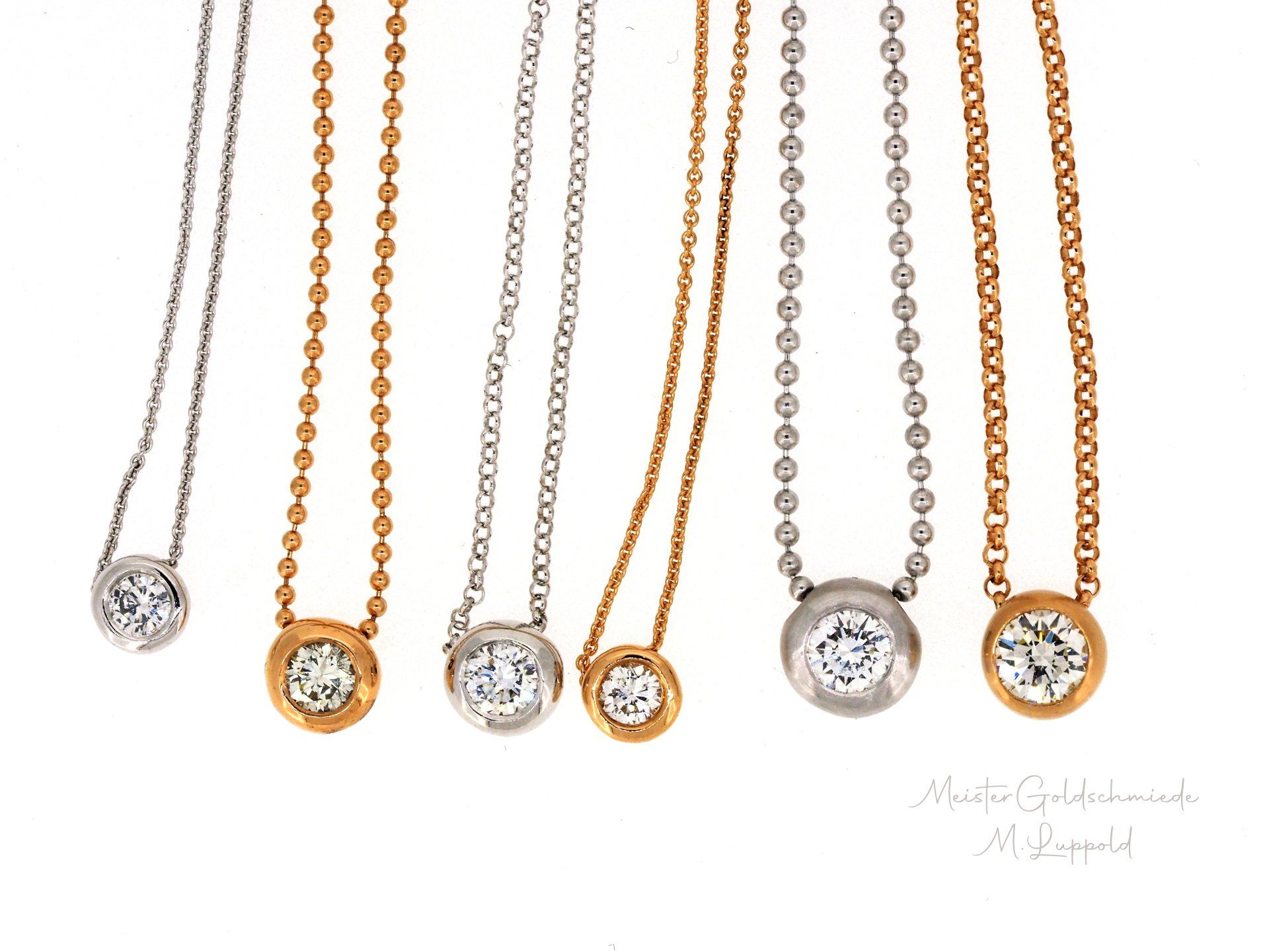 Brillantanhänger  gefasst in 750/-Weiß-,Gelb- und Rotgold