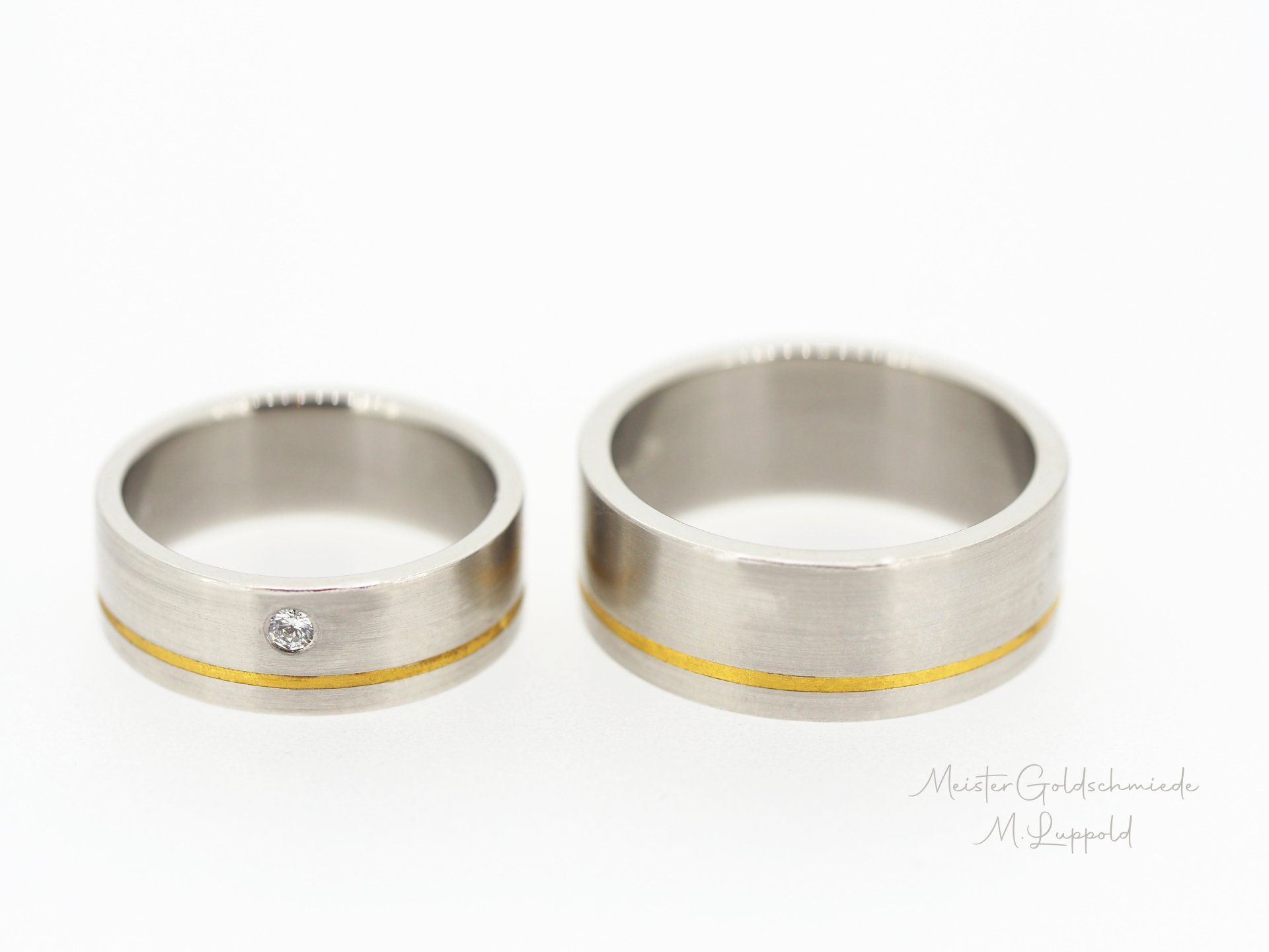 Trauringe 950/-Platin mit Feingoldeinlage und 1 Brillant 0,10ct