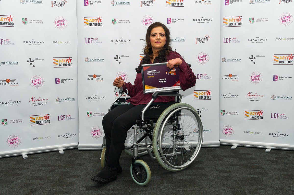 Farah Yasin poses with her award for Disability Sports Person of the year.