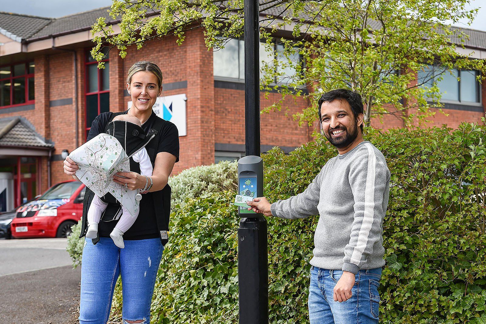 Man and woman with baby participate in Beat the Street Barnsley
