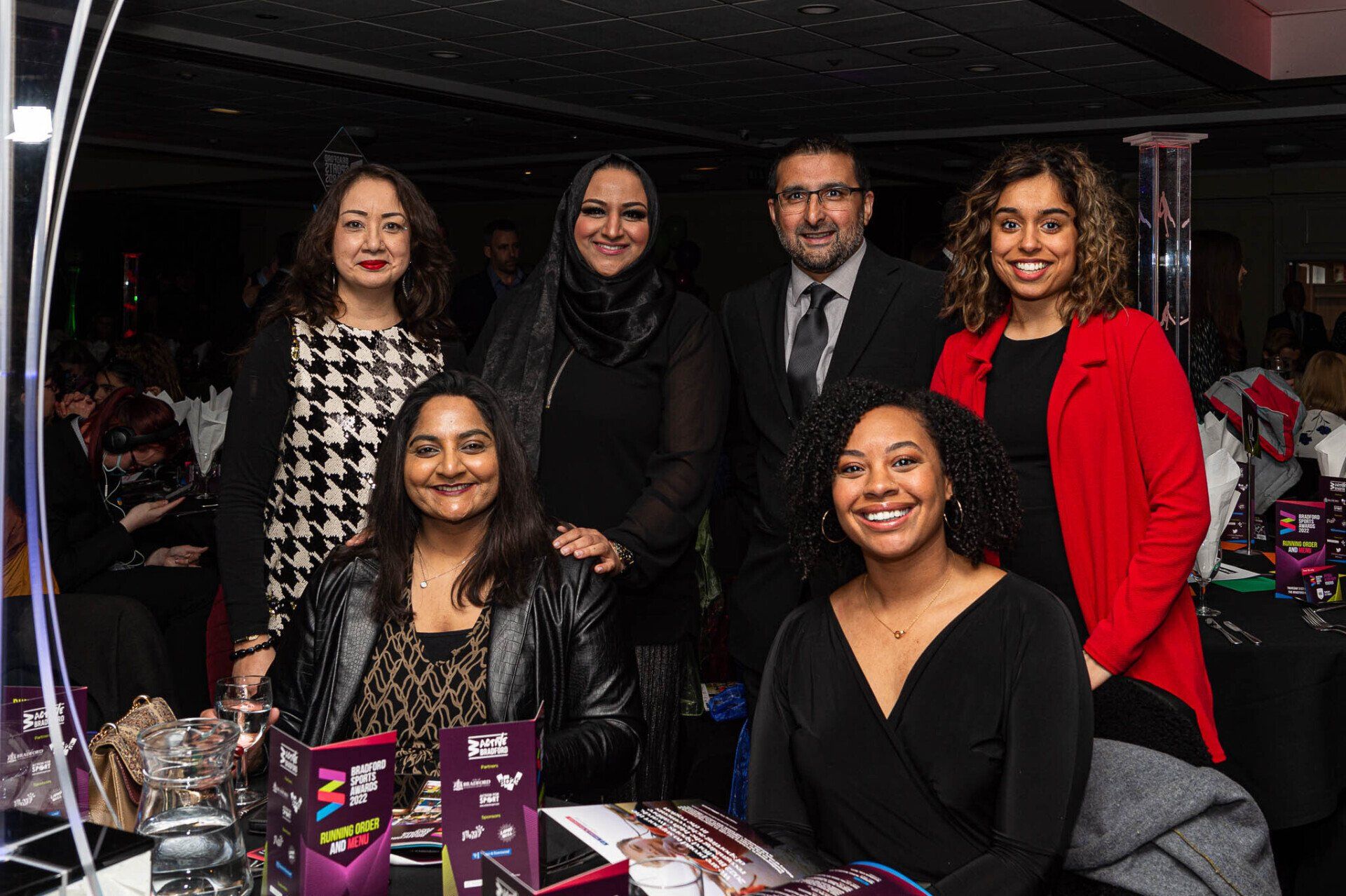Guests pose for a photo at their table ahead of the Bradford Sports Awards 2022.