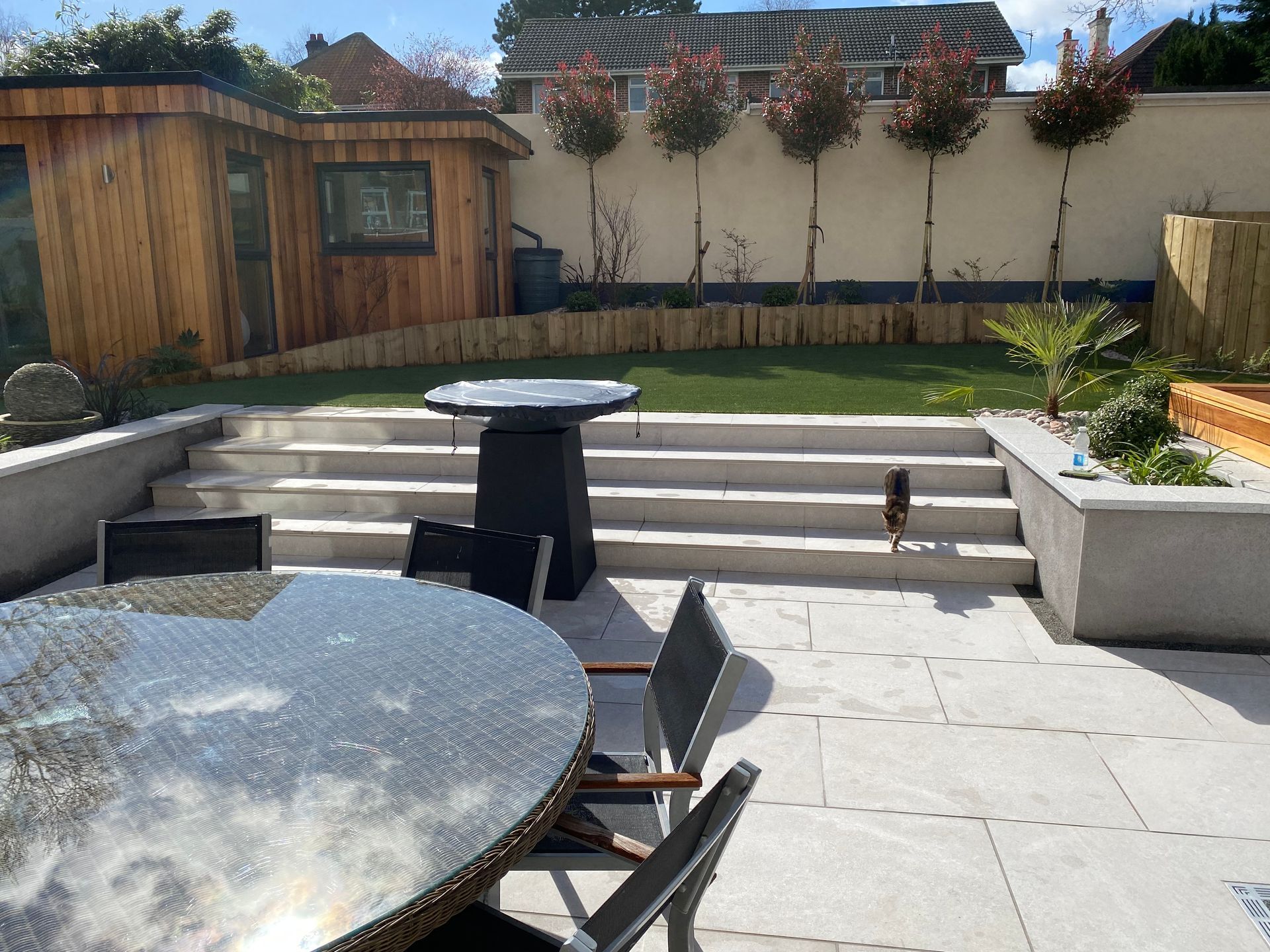 Patio steps up to garden lawn in Kings Park Bournemouth