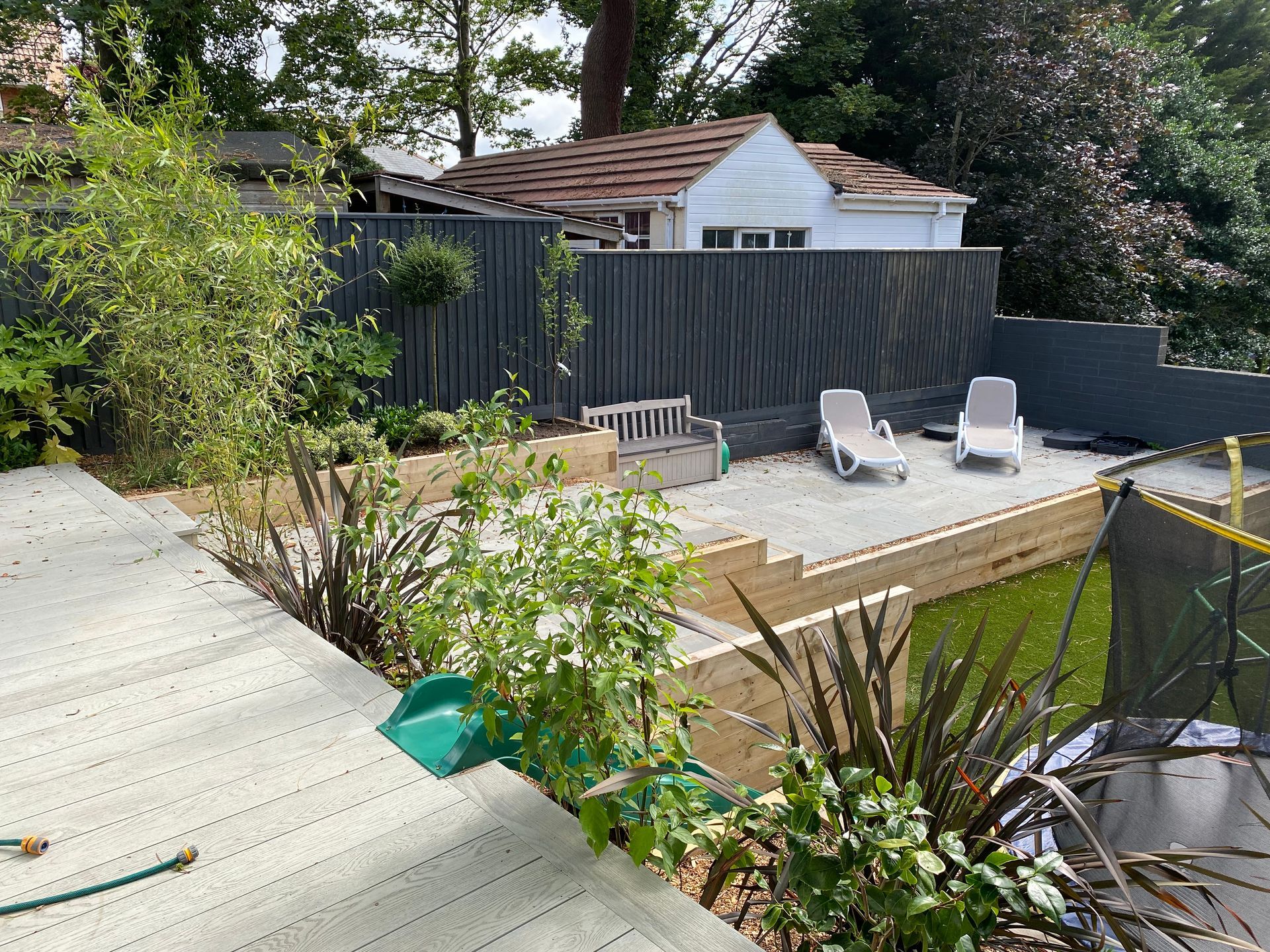 Timber clad raised deck in Parkstone garden