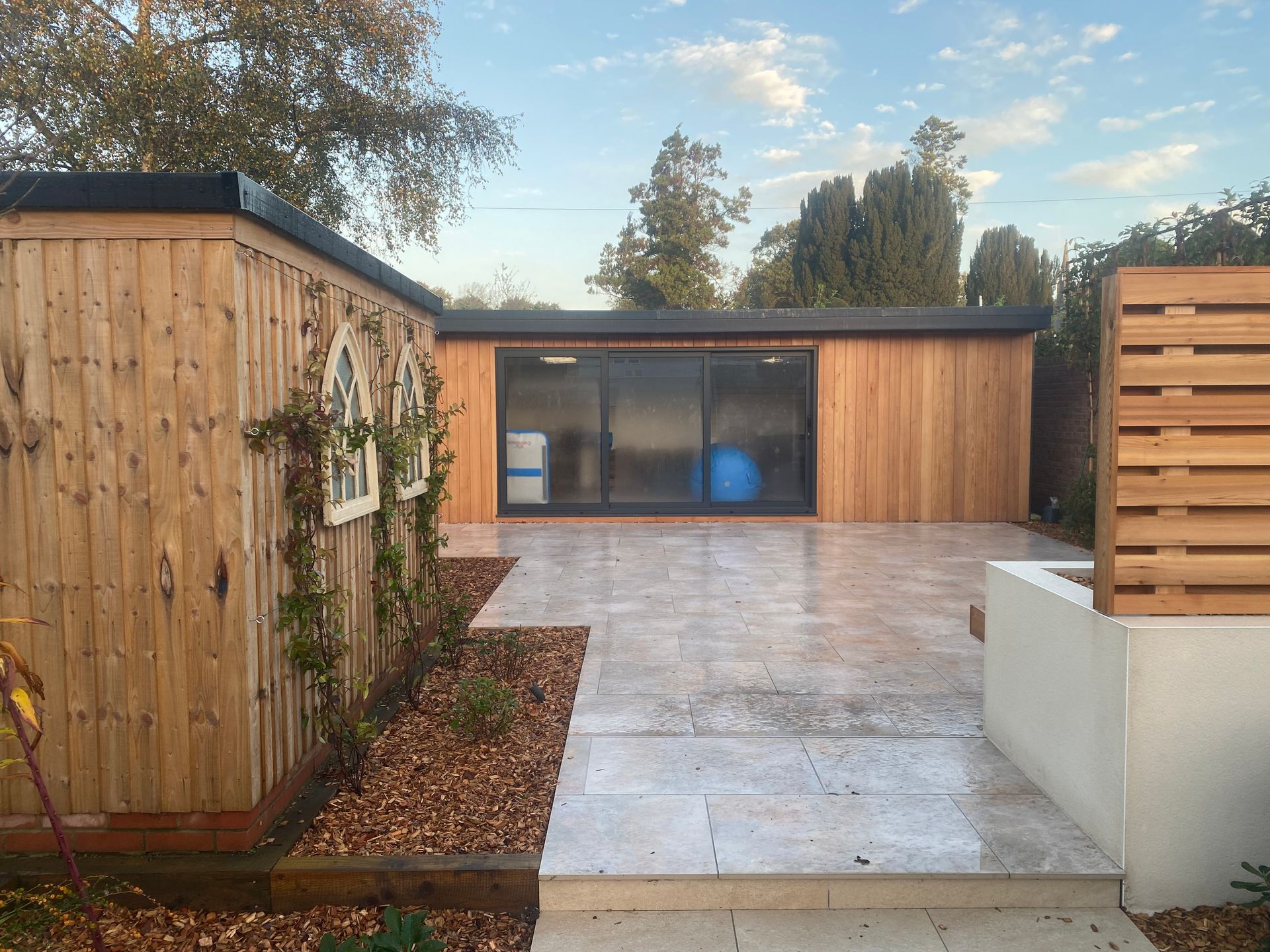 Garden room and paved patio in Wimborne, Dorset