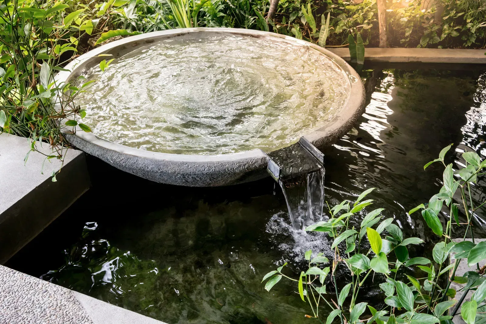 Waterfall feature and stream in Bournemouth garden