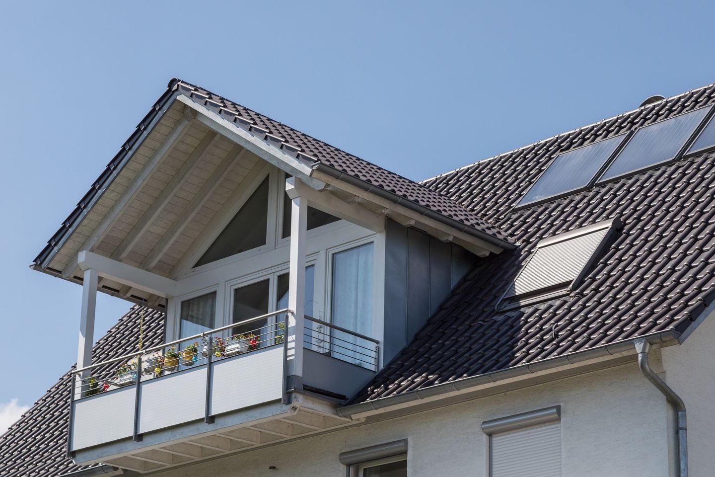 grey roof and sky