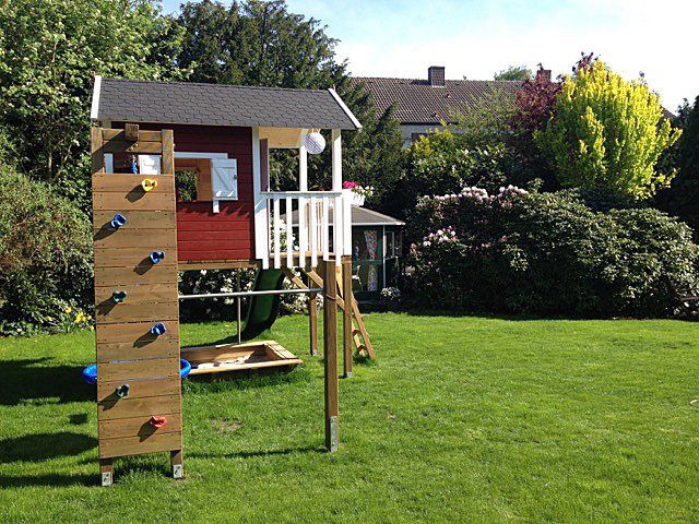 Kasohaus aus Deutschland - 35325 Mücke - Spielhaus mit Kletterwand, Nestschaukel und Rutsche, für Ihre Kinder ein Spielplatz aus Holz