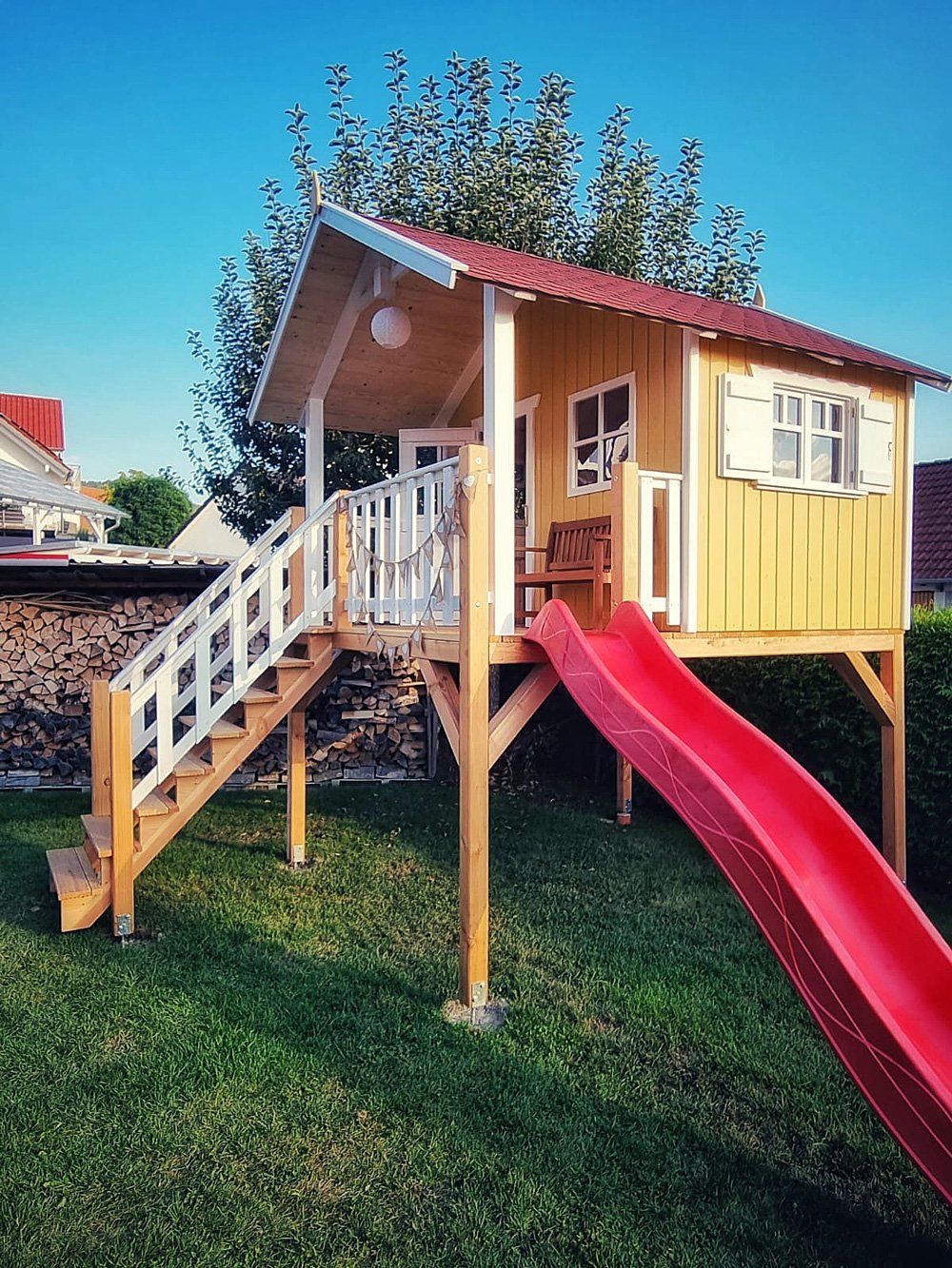 Hangefertigt aus Deutschland - 35325 in Hessen - Holzhaus, Stelzenhaus, Spielhaus Jonas mit Rutsche und Treppenanbau
