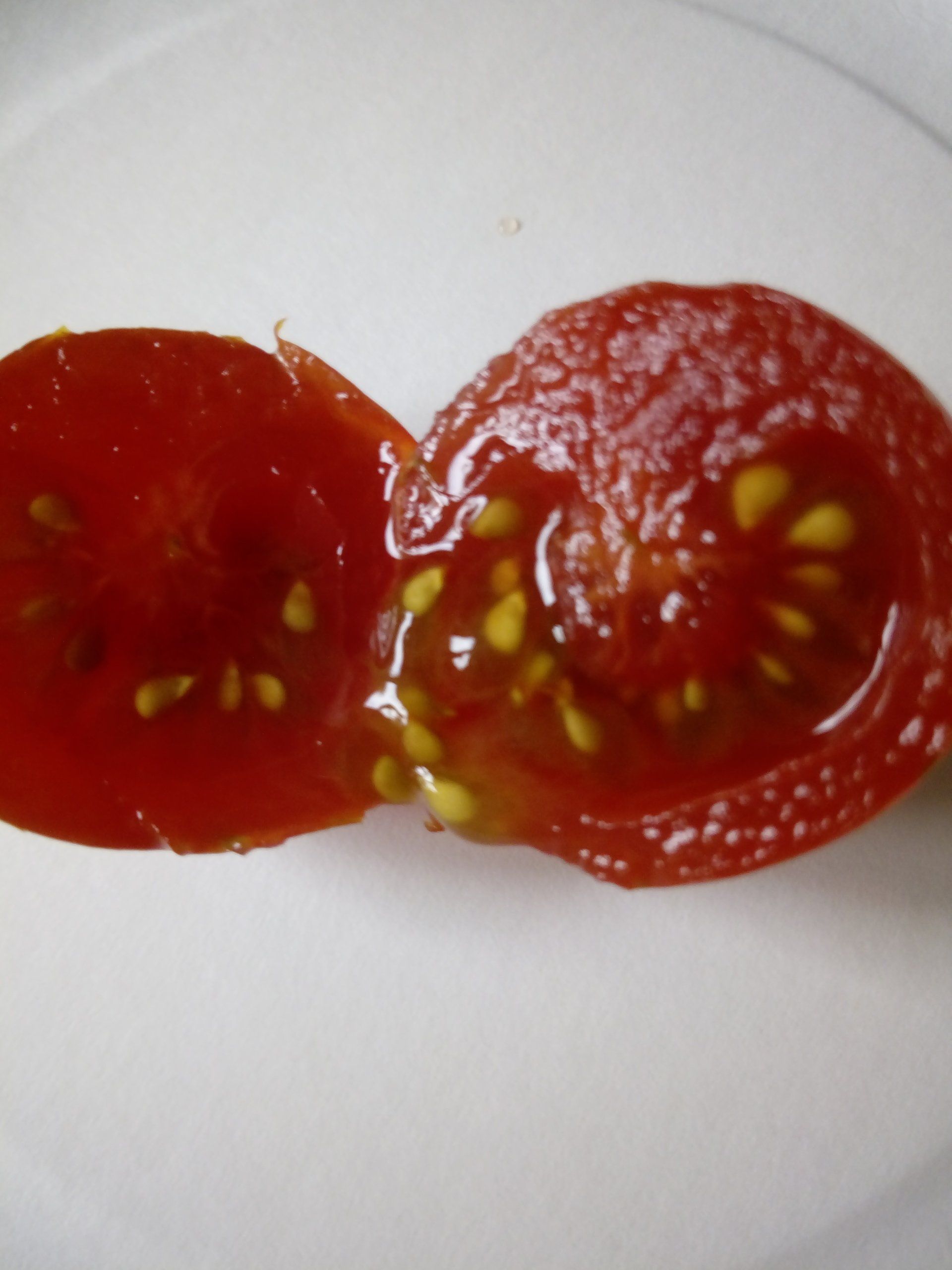 Tomatoes Cut in Half Showing the Seeds