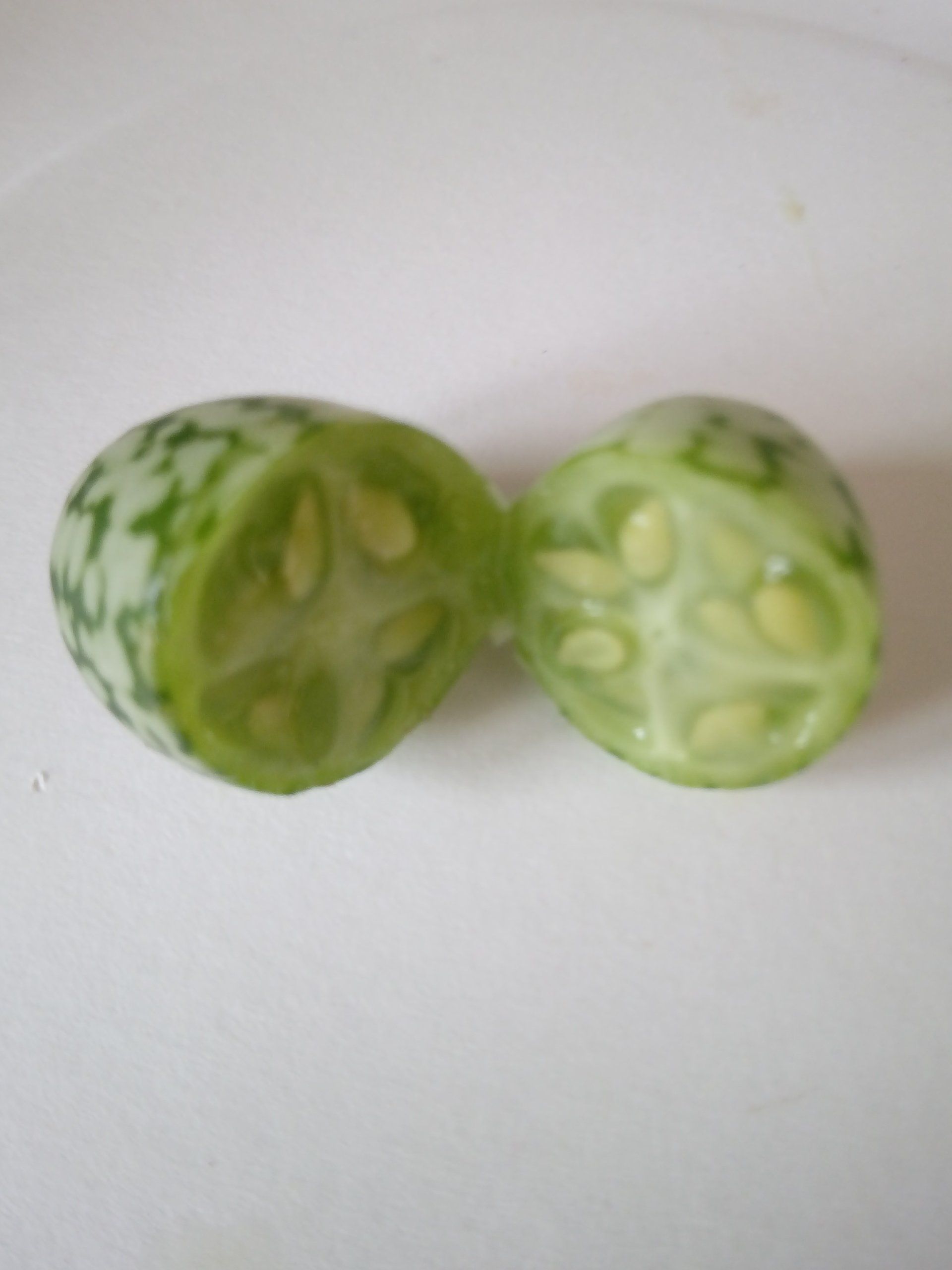 Cucamelons Cut in Half Showing the Seeds