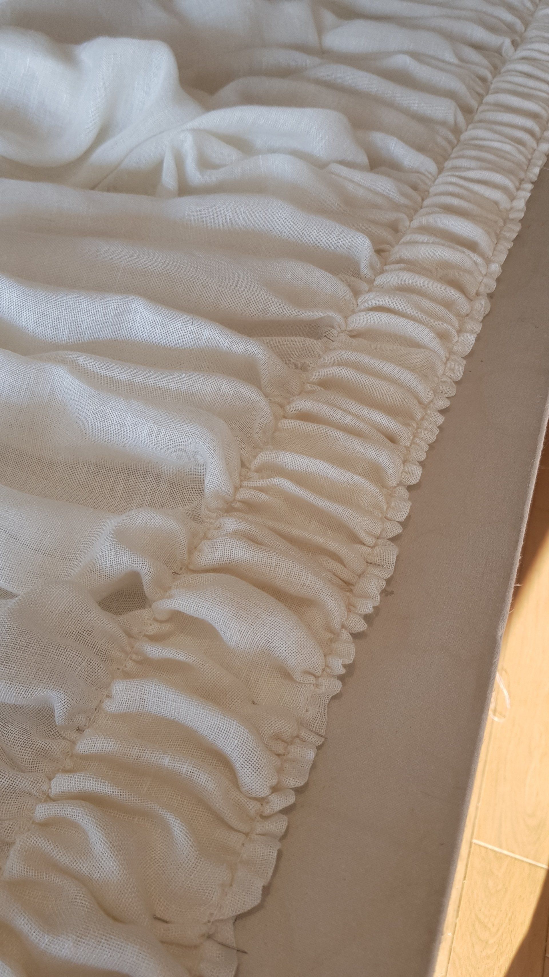 Tête de voilage froncée.