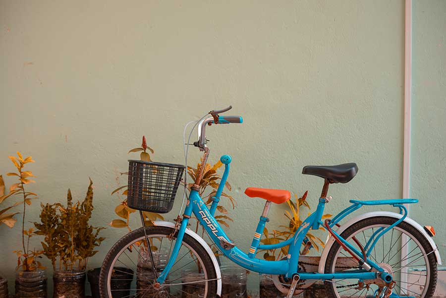Bike parked at the front of a house in Malé, Maldives Bike parked at the front of a house in Malé, Maldives