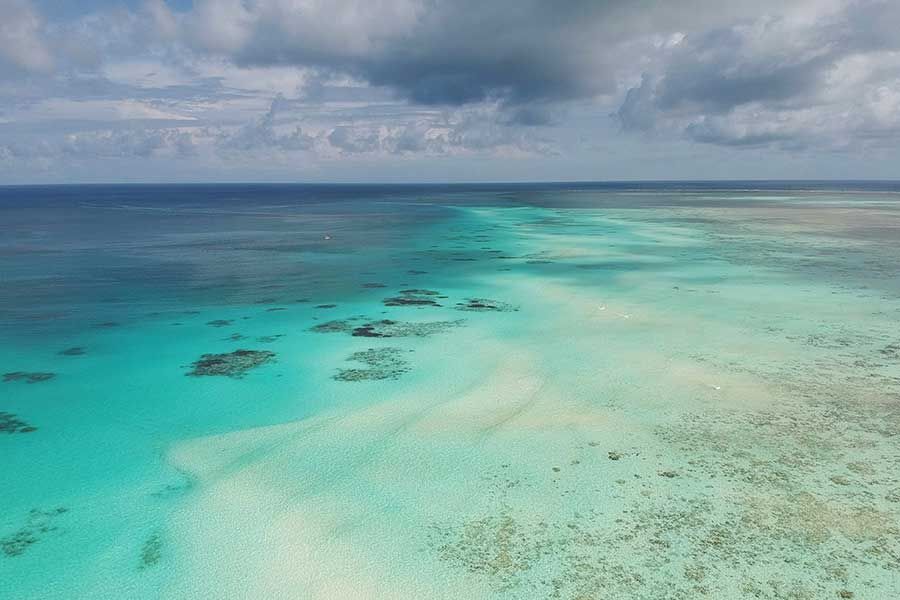 Aerial view of coral reef and sandbanks in the turquoise waters off Zanzibar Aerial view of coral reef and sandbanks in the turquoise waters off Zanzibar