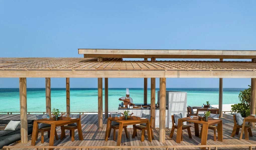 Open-air Maldives dining terrace with uninterrupted views of the Indian Ocean Open-air Maldives dining terrace with uninterrupted views of the Indian Ocean