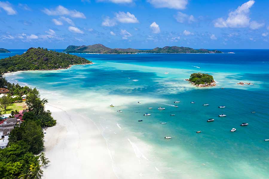 Praslin Island, Seychelles Aerial view of a Seychelles island and its surrounding reef