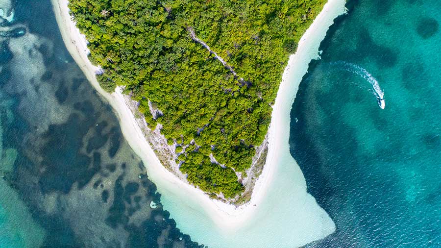 Noonu Atoll, Maldives Aerial view of a Maldives atoll and its surrounding reef