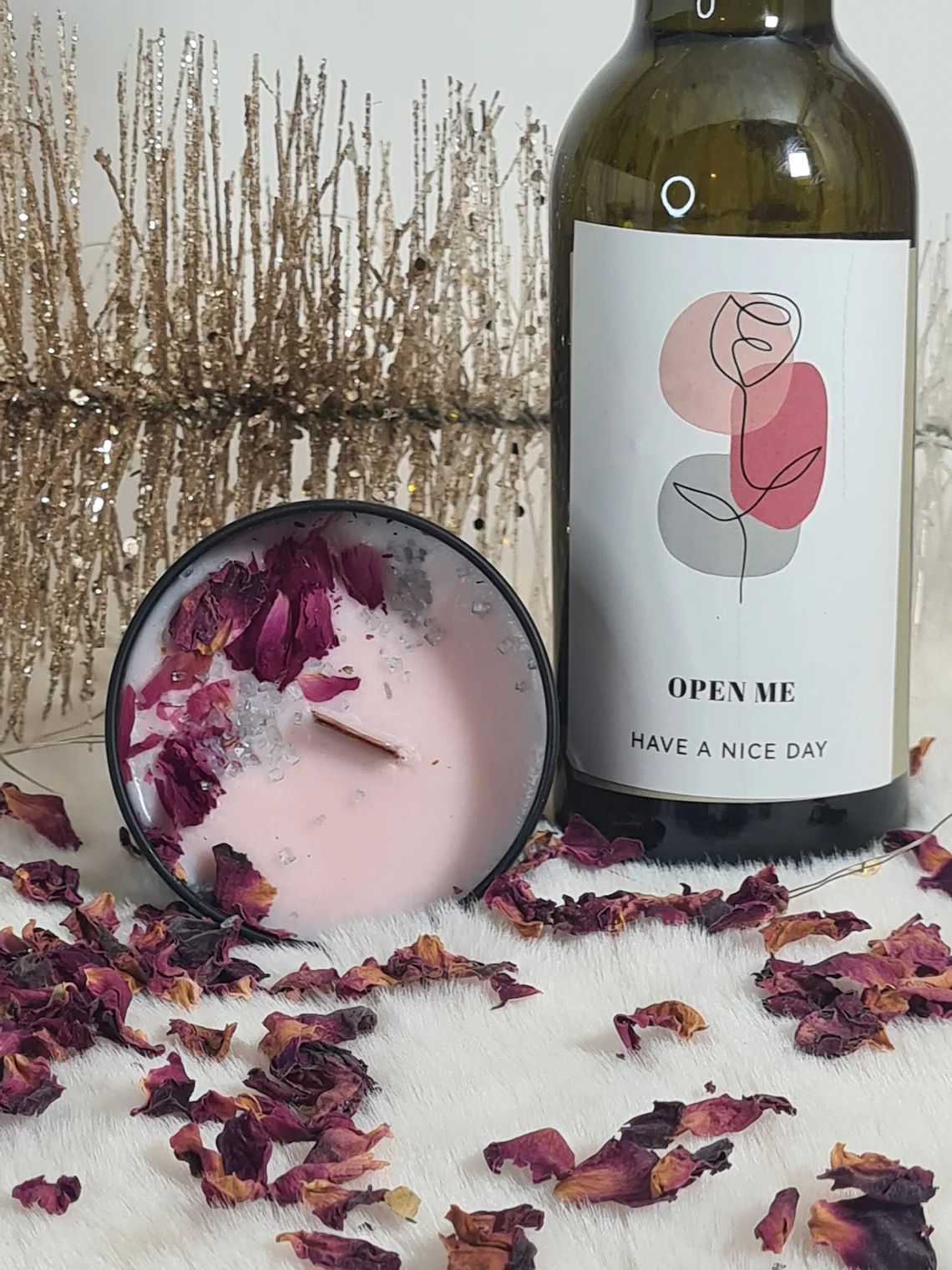 Duftknisterkerze mit Glitzereffekt und der Duftrichtung Rosé Champagner