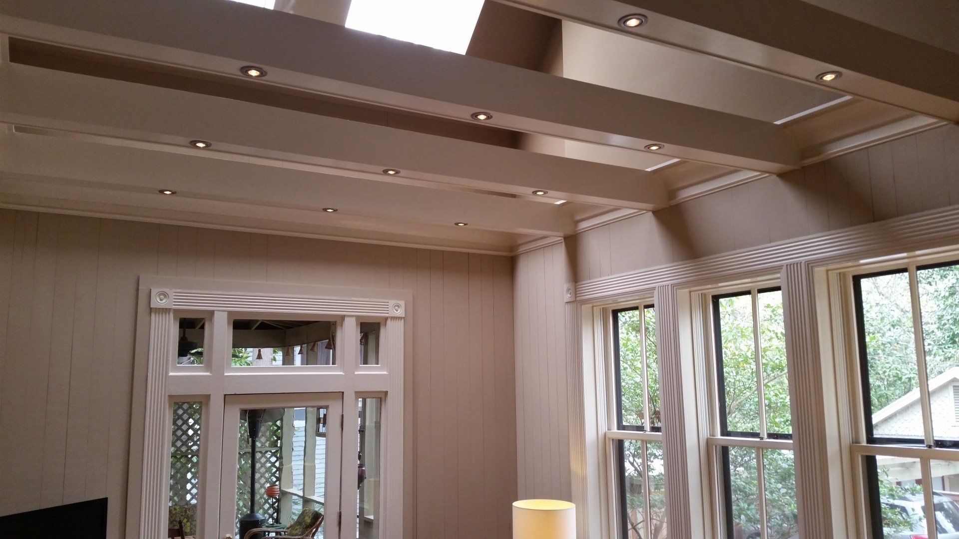 custom built beams in ceiling with lights