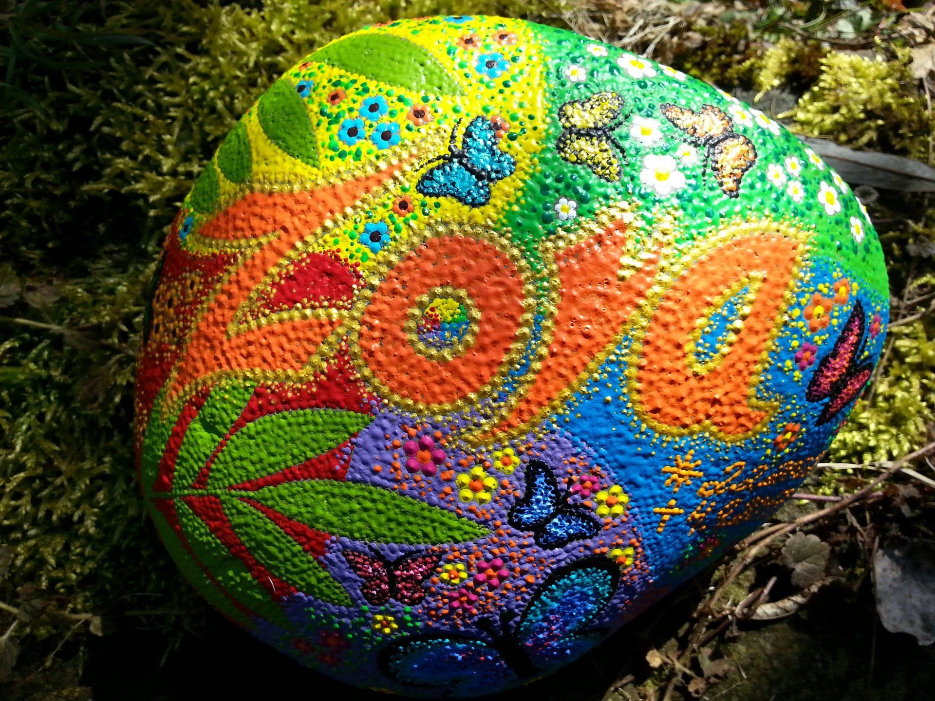 grün-gelb-blau töne mit Schriftzug Zora