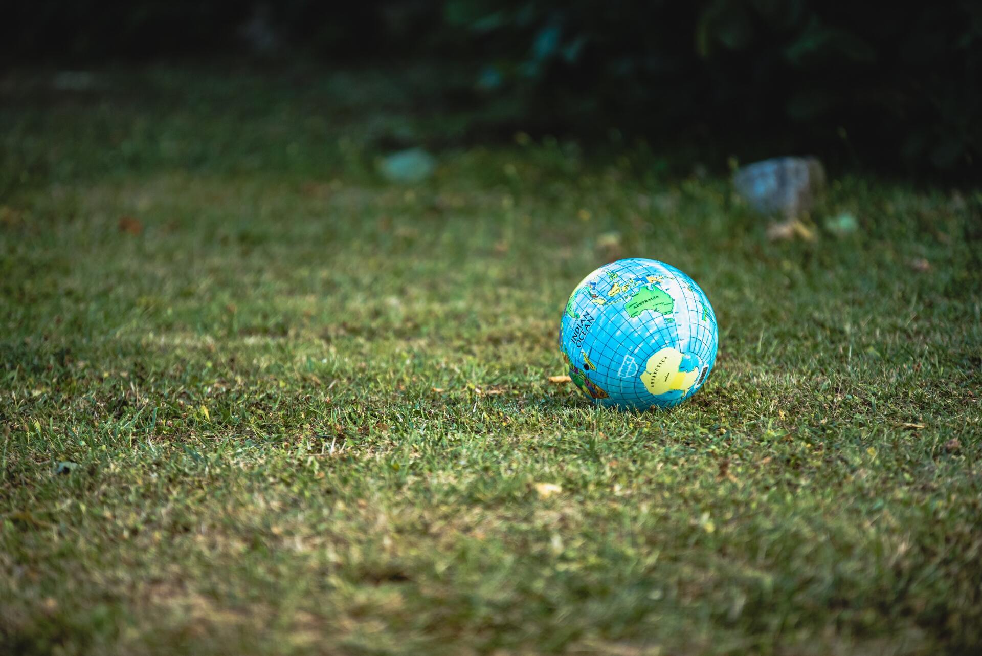 A globe on grass