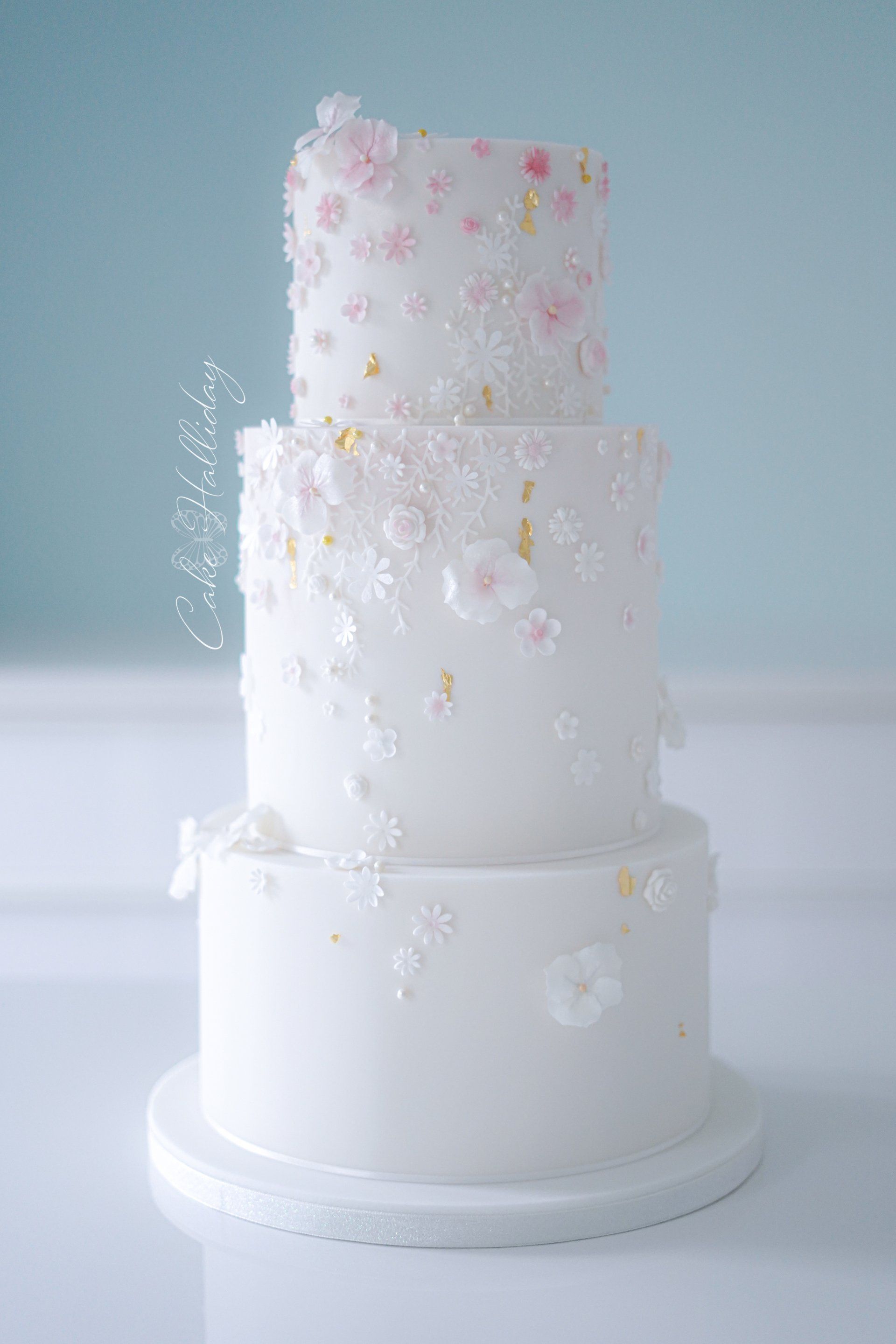 Pink blossom wedding cake