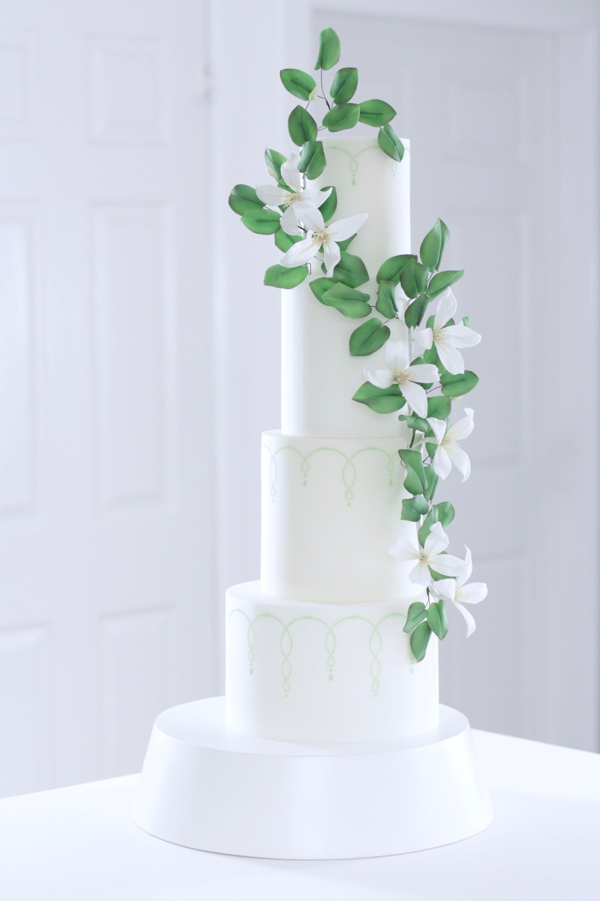 Sugar clematis & teardrop stencil wedding cake