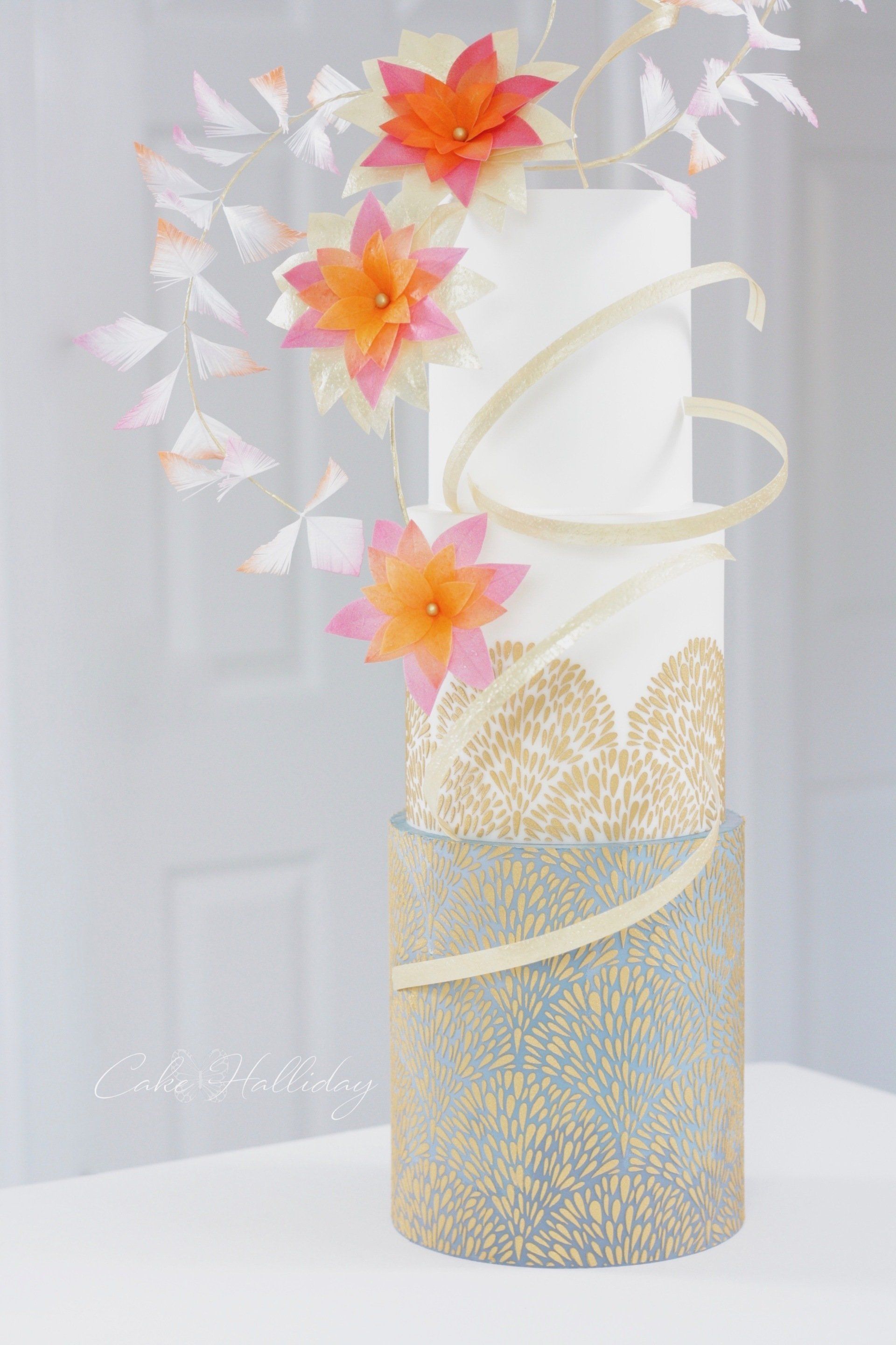 Wafer paper flowers and fan stencil wedding cake