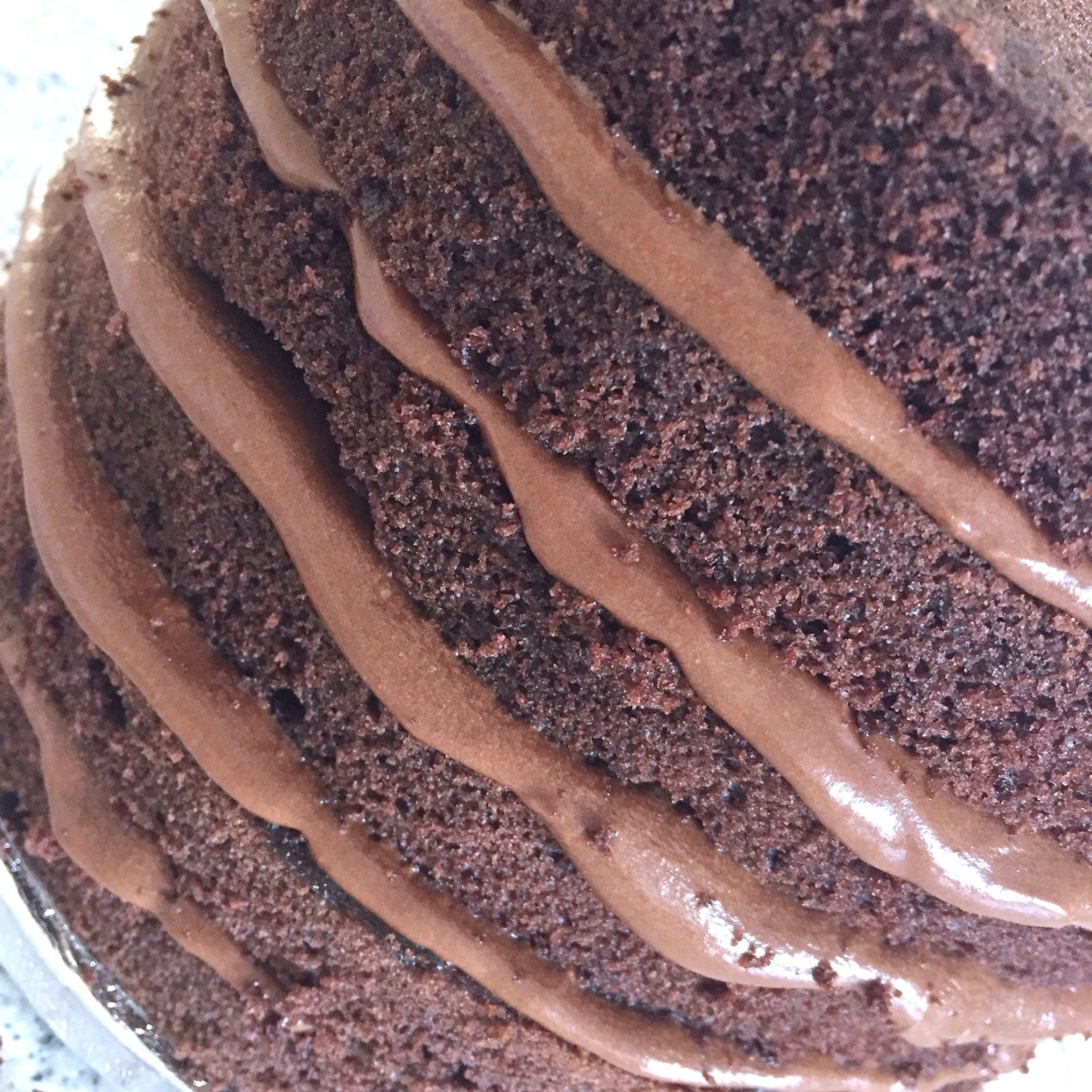 Rich indulgent chocolate cake with chocolate buttercream ganache