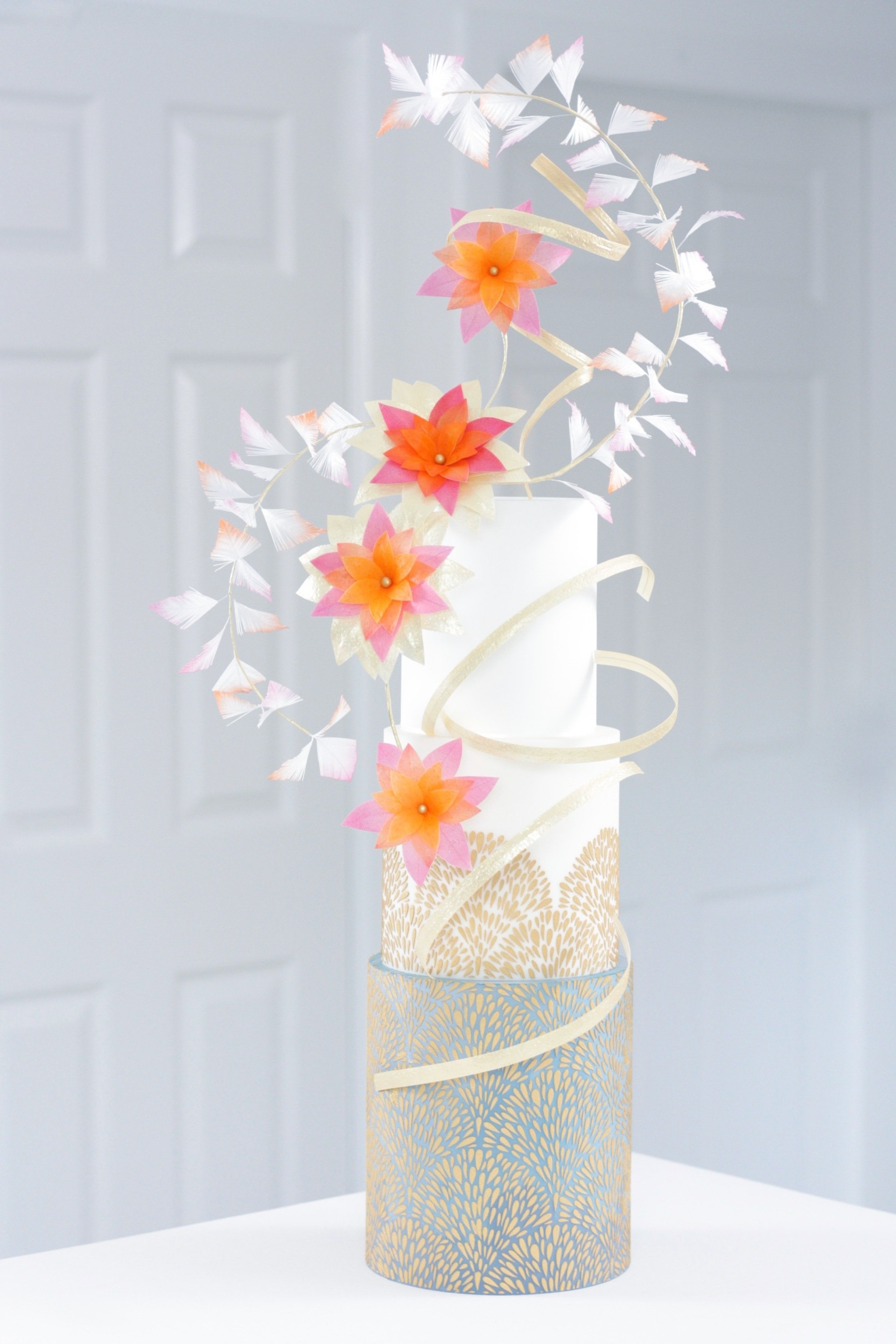 Whimsical  wafer paper flowers & fan stencil wedding cake
